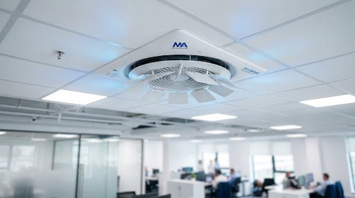 Industrial ceiling cassette cooling unit with 360 degree airflow vanes